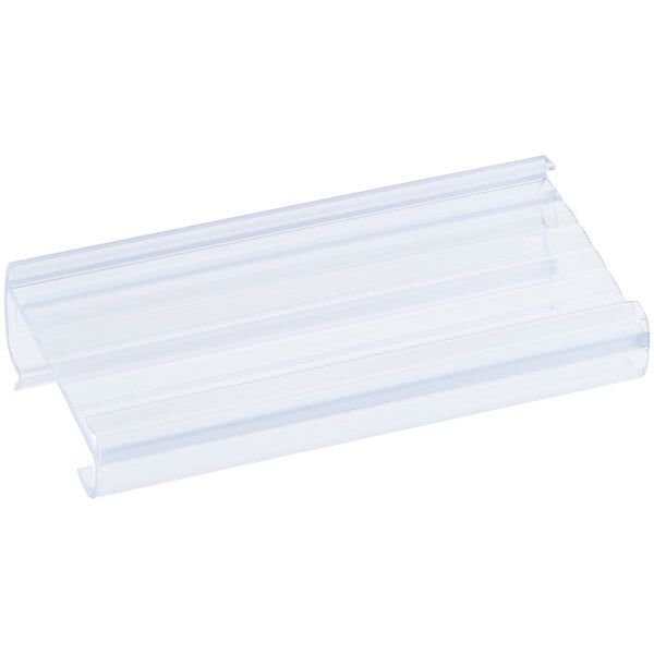 A clear plastic label holder designed for wire shelving.
