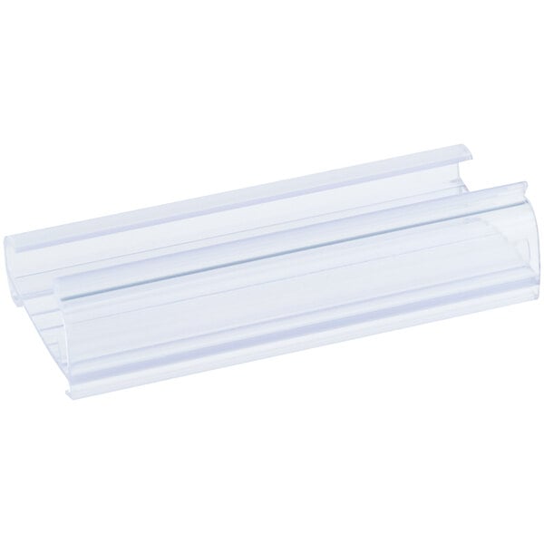 A clear plastic label holder designed for wire shelving.