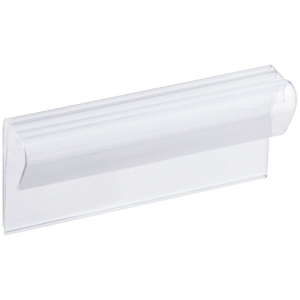 A clear plastic clip-on label holder for shelving, measuring 3 inches by 1 1/4 inches.