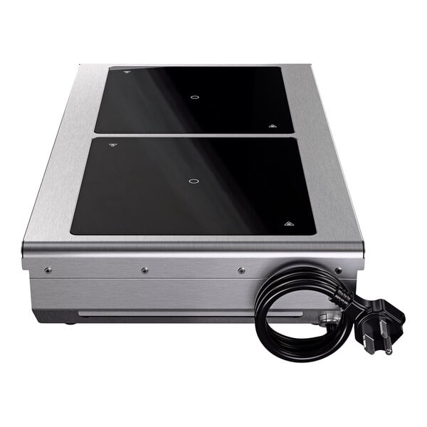 A stainless steel dual hob front to back countertop induction range with a black glass top and attached power cord.