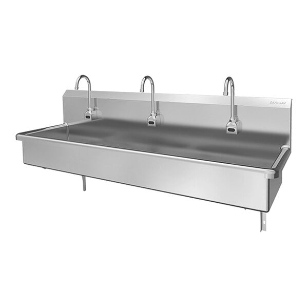 A stainless steel, wall-mounted, three-person sensor-activated hands-free sink.