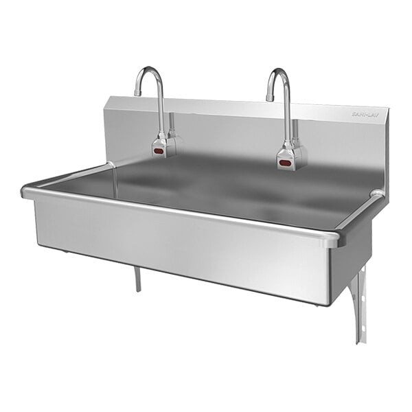A stainless steel, wall-mounted, two-person sensor-activated hands-free sink.