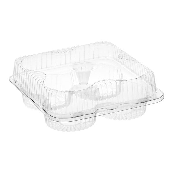 A clear plastic hinged container with four compartments and a medium dome lid for holding jumbo cupcakes or muffins.