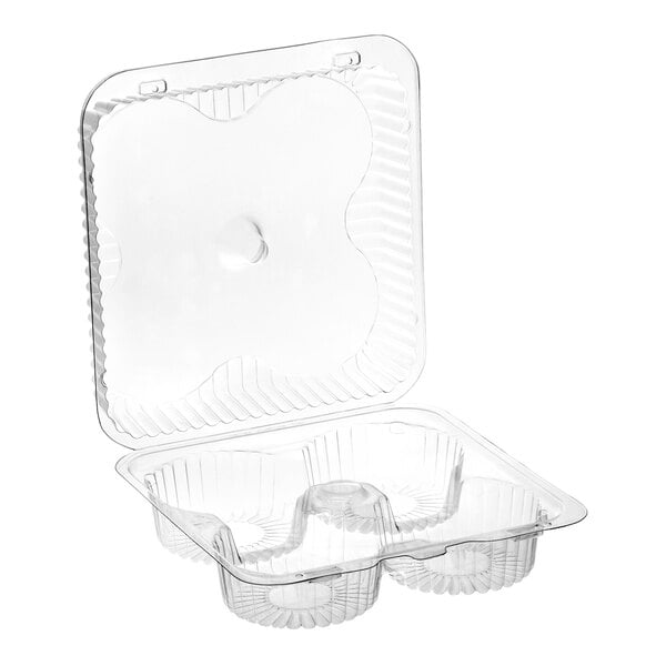 A clear plastic hinged container with four compartments and a medium dome lid for holding jumbo cupcakes or muffins.