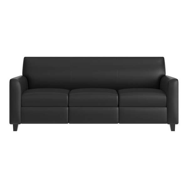 A black leather sofa with three seats, wooden feet, and built-in charging banks.