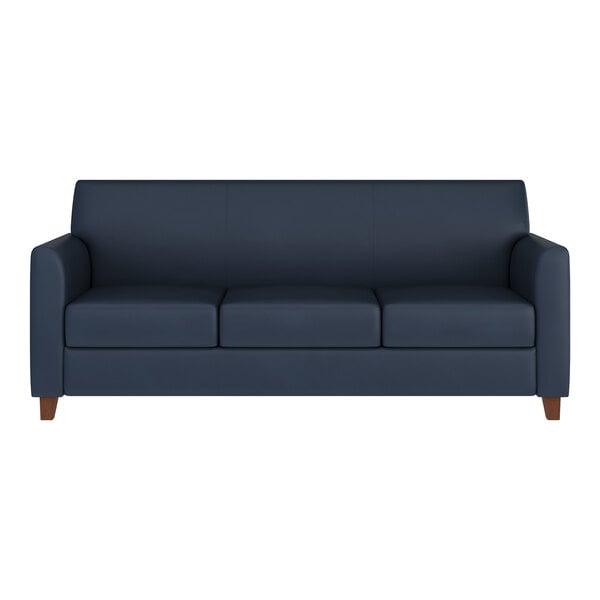 A navy blue three-seat sofa with wooden feet and a modern design.