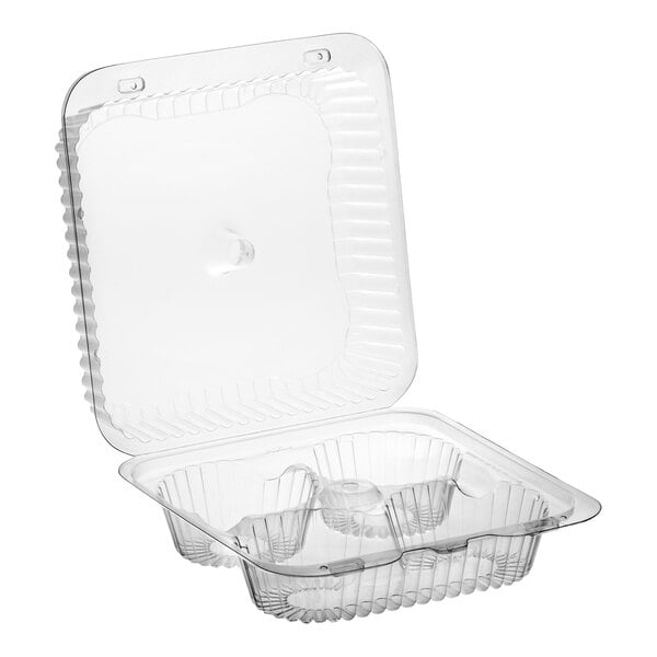 A clear plastic hinged container with four compartments and a low dome lid, designed for holding jumbo cupcakes or muffins.