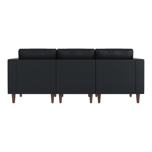 A black three-seat sofa with wooden legs and two built-in charging banks.