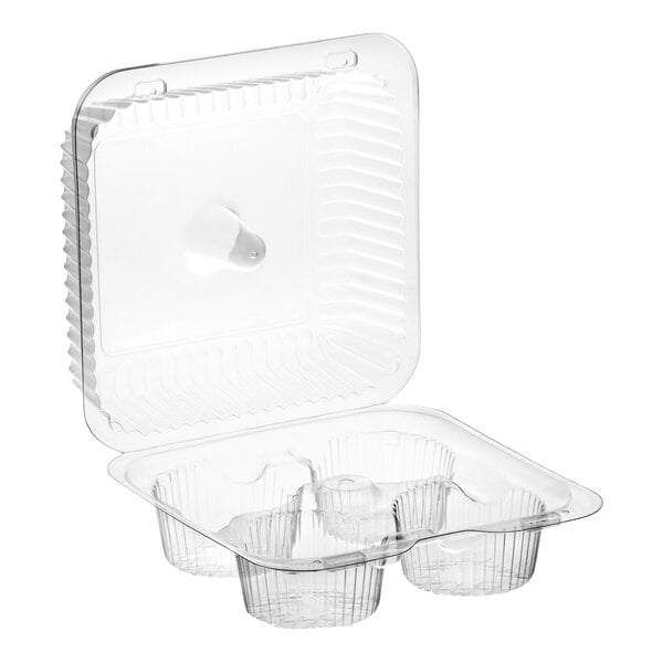 A clear plastic hinged container with four compartments and a high dome lid for holding cupcakes or muffins.