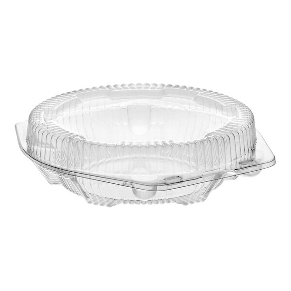 A clear plastic hinged pie container with a low dome lid.
