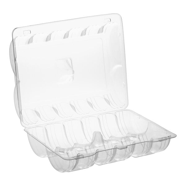 A clear plastic hinged container with 12 compartments for holding donuts.