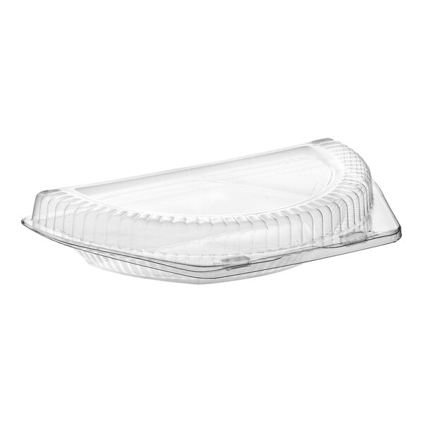 A clear plastic hinged half-pie container with a low dome lid.