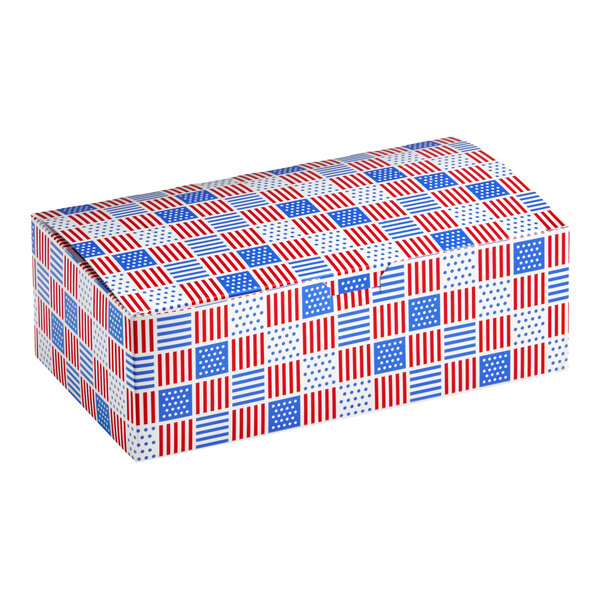A rectangular take out lunch box with a patriotic USA print in red, white, and blue, featuring a tuck top.