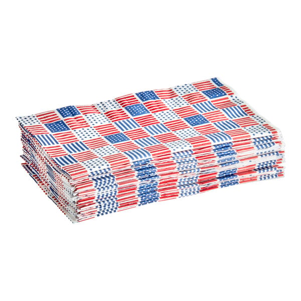 A stack of 2-ply paper dinner napkins with a patriotic American flag print.