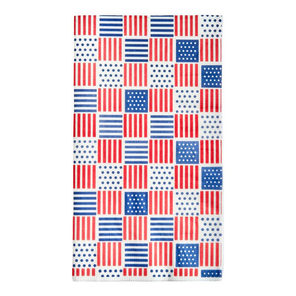 A rectangular paper dinner napkin with a red, white, and blue patriotic print featuring stripes, dots, and squares.