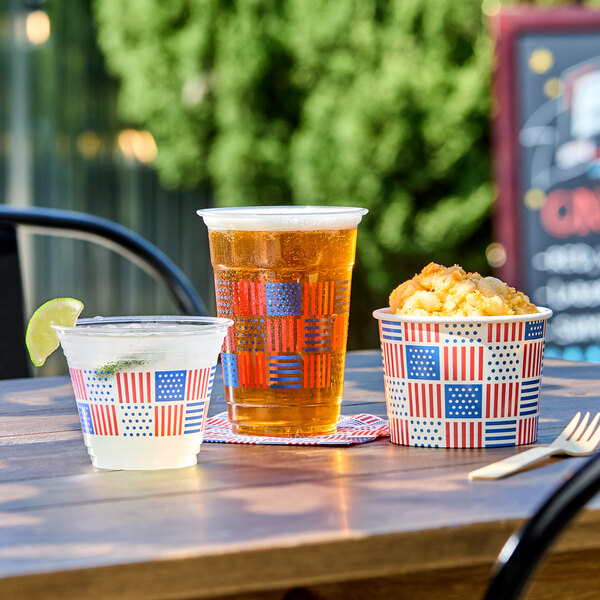 A patriotic print 2-ply paper beverage or cocktail napkin with a red, white, and blue American flag design.