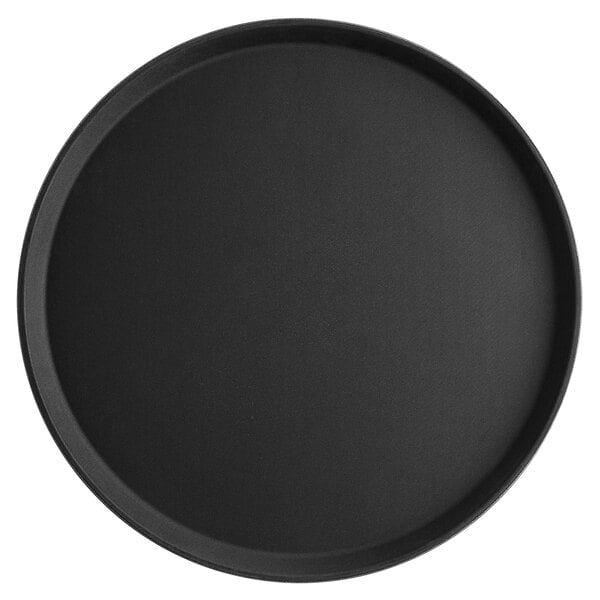 A large, round, black fiberglass serving tray with a non-skid surface.
