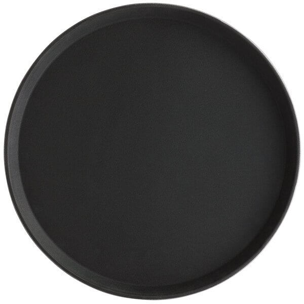 A large, round black fiberglass serving tray with a non-skid surface.