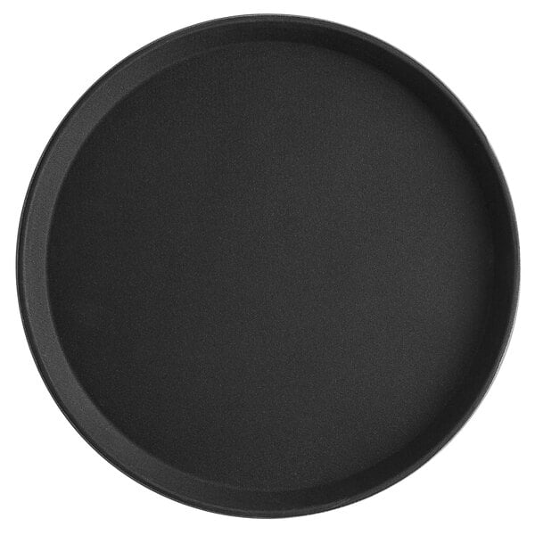 A black round fiberglass non-skid serving tray.