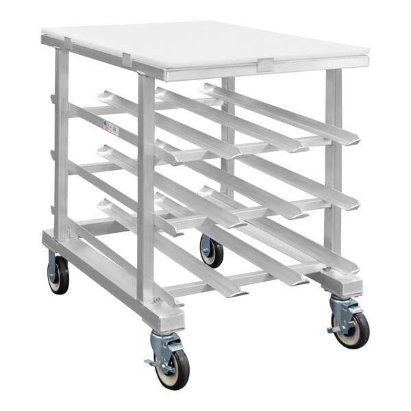 A heavy-duty counter height mobile aluminum can rack with a food-grade HDPE top designed for #10 and #5 cans.