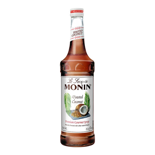 A 750 mL bottle of Monin Premium Toasted Coconut Flavoring Syrup.