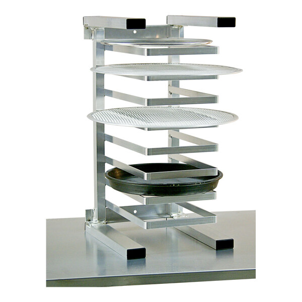 An aluminum countertop pizza pan rack with eight slots for holding 10 to 18 inch pans.