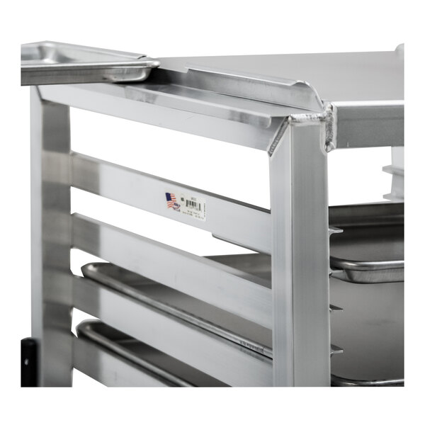 A heavy-duty aluminum slicer and mixer stand with multiple tray slides.
