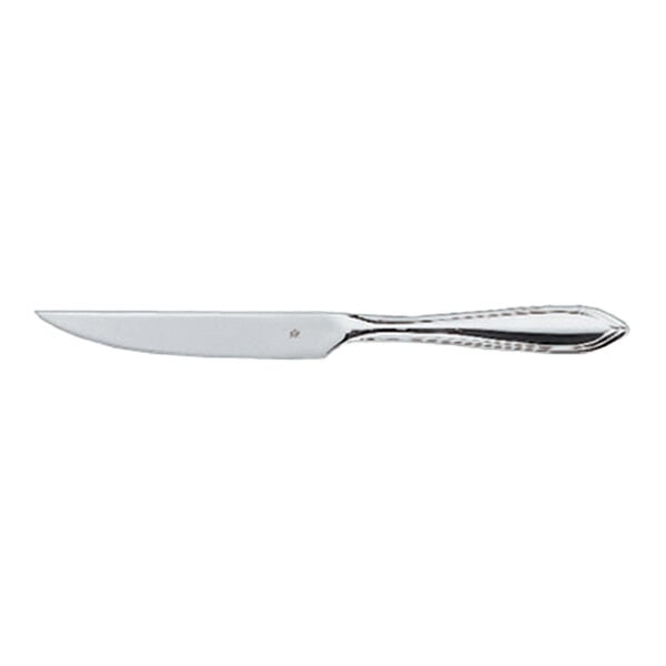A stainless steel steak knife with a polished finish and a decorative handle.
