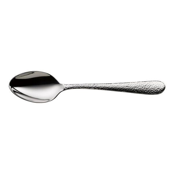 A large stainless steel teaspoon with a textured handle.
