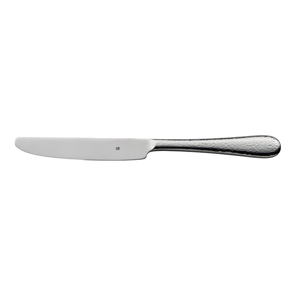 A stainless steel table knife with a textured handle.