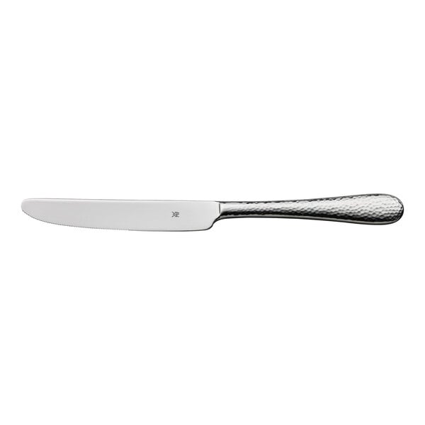 A stainless steel dessert knife with a textured handle and a smooth, slightly serrated blade.