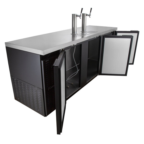 A commercial beer dispenser with a stainless steel countertop, dual tap towers, and open refrigerated storage compartments.