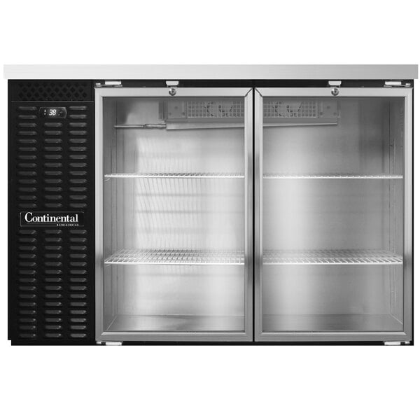 A commercial back bar refrigerator with two glass doors and metal shelving.