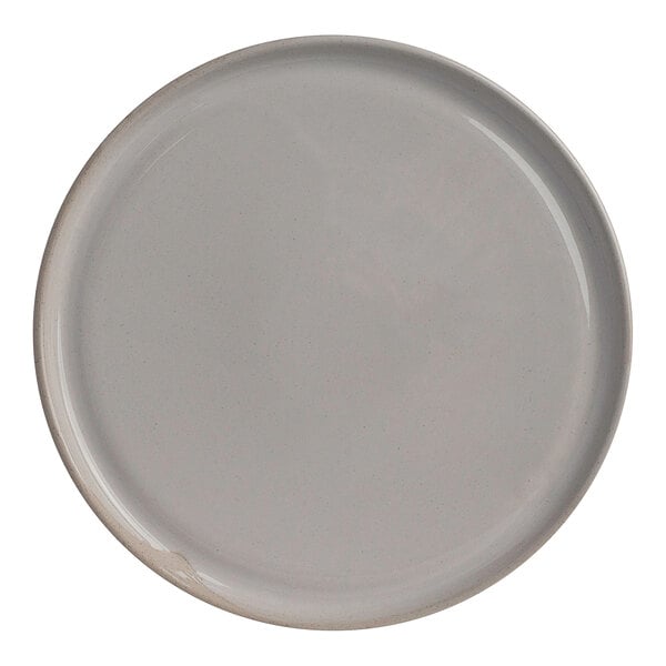 A round white stoneware plate measuring 9 1/8 inches in diameter.