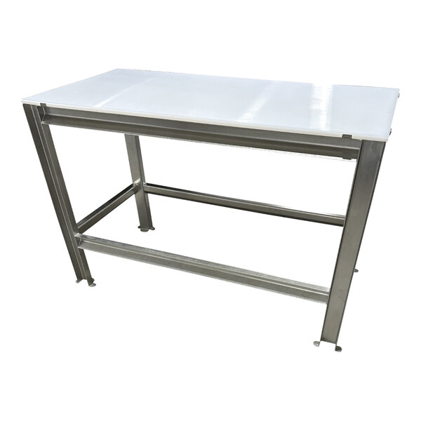 A stainless steel table with a white poly top and paw print footing.