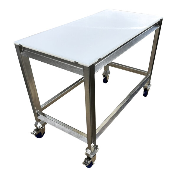 A stainless steel table with a white poly top and four caster wheels.