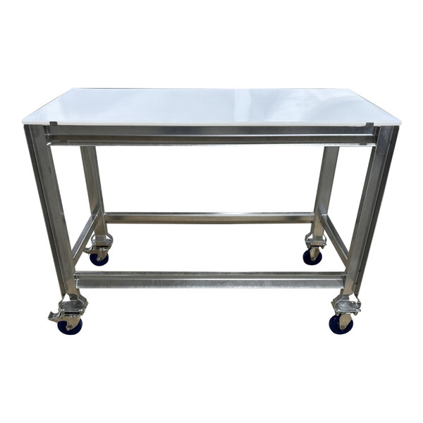 A stainless steel table with a white poly top and four blue casters.