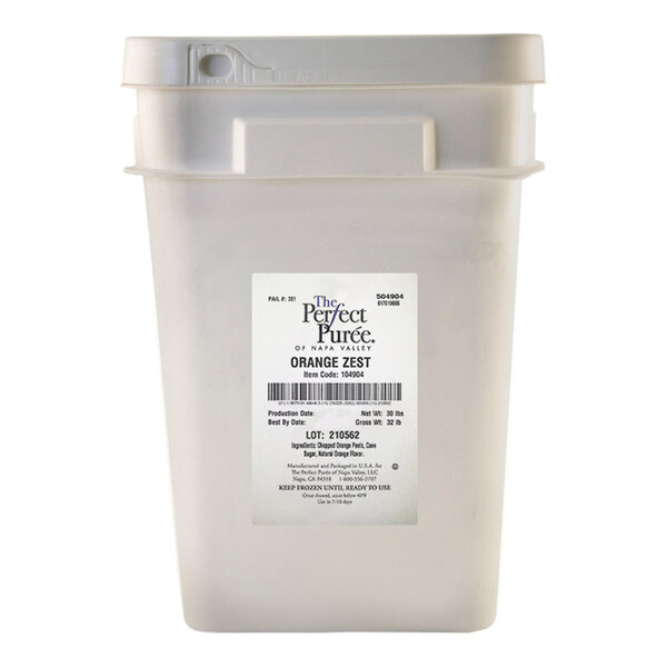 A large plastic container of Perfect Puree Orange Zest weighing 30 pounds.