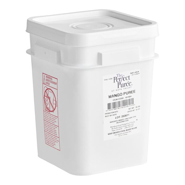 A large white plastic container of Perfect Puree Mango Puree weighing 30 pounds.