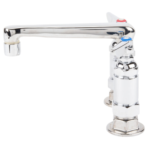 A close-up of a chrome T&S deck-mount faucet with two silver handles and a blue label on one handle.