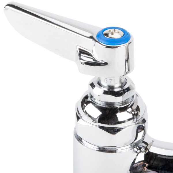 A T&S chrome deck-mount faucet with blue handles.
