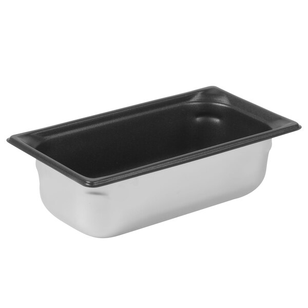A stainless steel Vollrath steam table pan with SteelCoat Non-Stick coating.