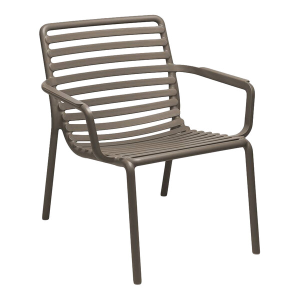 A brown resin outdoor armchair with a slatted design and stackable construction.