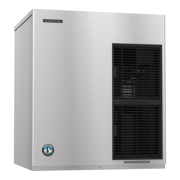 A stainless steel modular ice machine with black ventilation grilles on the front.