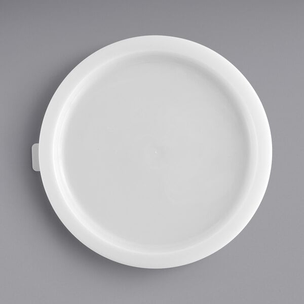 A white round polyethylene food storage container lid.
