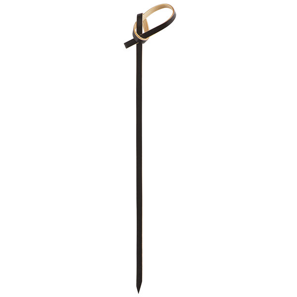A black bamboo knot food pick or skewer with a looped end.