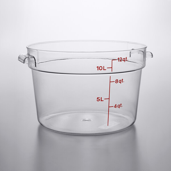 A clear round polycarbonate food storage container with red measurement markings and side handles, holding up to 12 quarts or 10 liters.