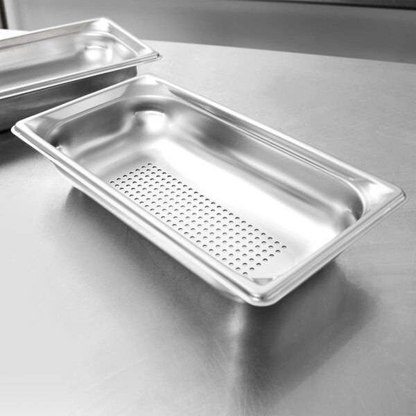 Vollrath Super Pan 3® 22 Gauge 1/3 Size 2 1/2" Deep Anti-Jam Perforated Stainless Steel Steam Table / Hotel Pan 90323