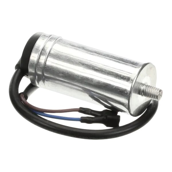 A cylindrical metal start capacitor with attached wires, used for compressors.