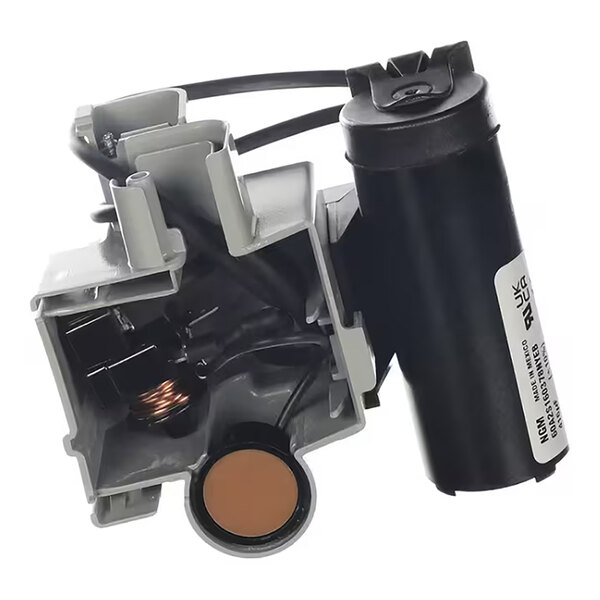 A commercial refrigeration compressor unit with attached components.